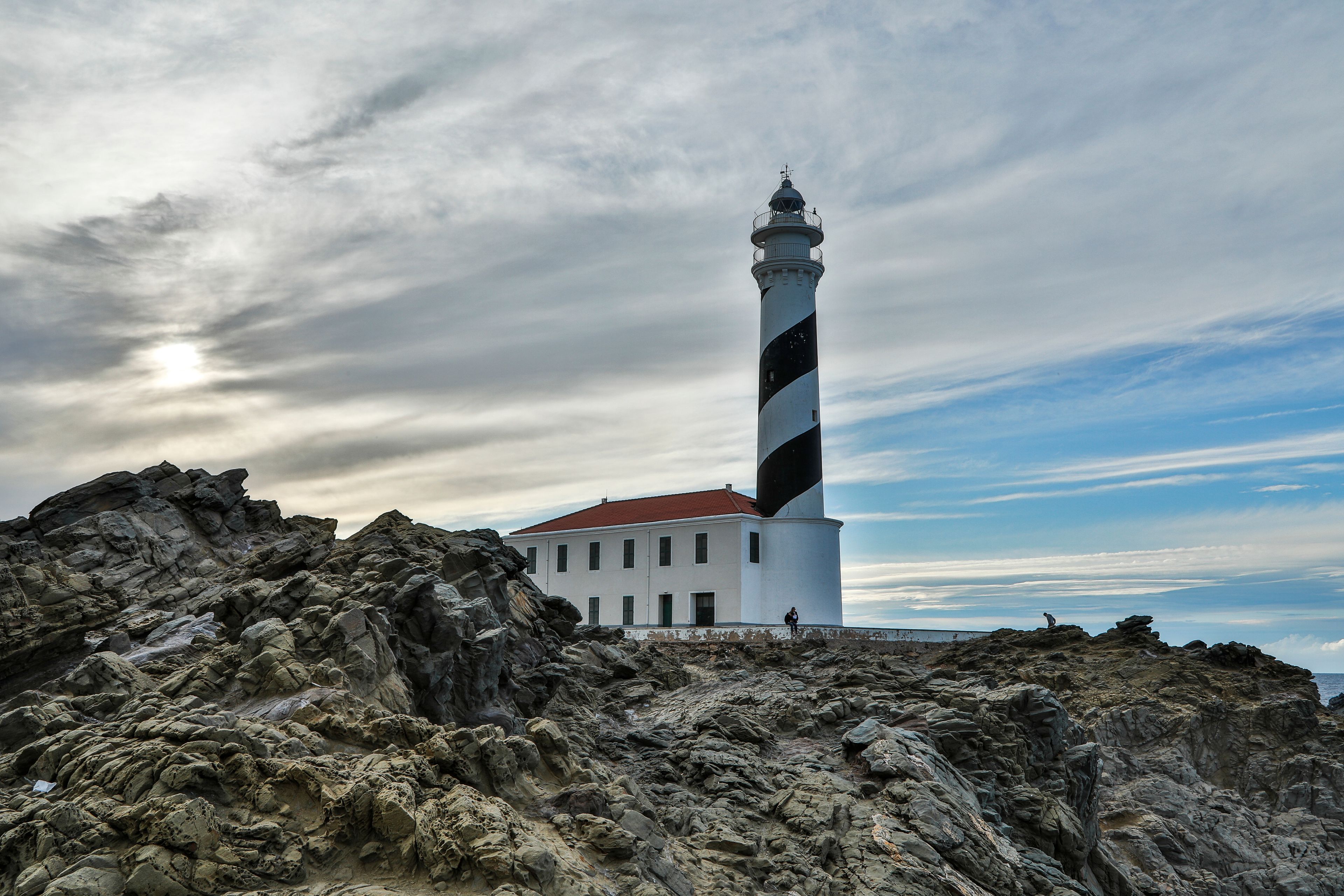 Spain, Menorca. Lighthouse at Cavalleria at sunrise.