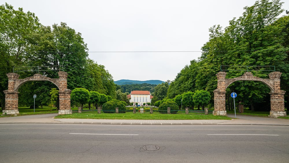 Banja Koviljaca, Serbia - July 13, 2019: Beautiful formal garden, park with trees, bush, flowers and architecture in medical wellness center Banja Koviljaca, leisure, disabilities and holiday