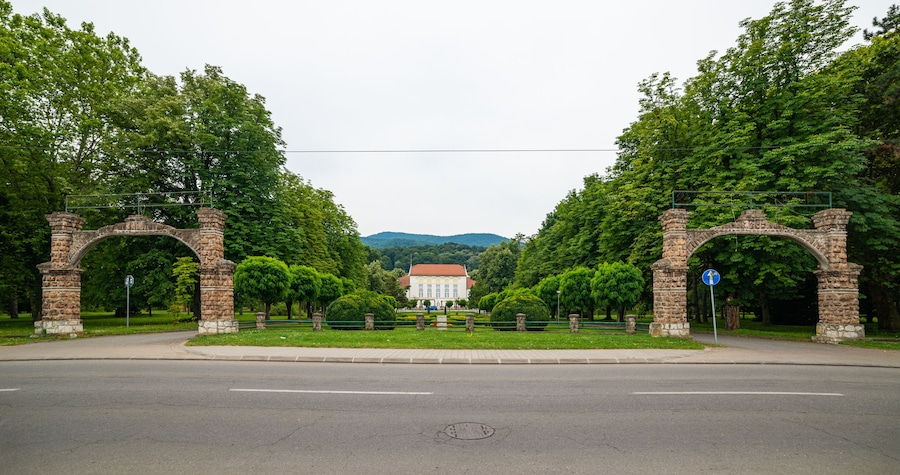 Banja Koviljaca, Serbia - July 13, 2019: Beautiful formal garden, park with trees, bush, flowers and architecture in medical wellness center Banja Koviljaca, leisure, disabilities and holiday