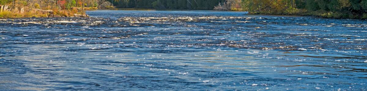 North Woods River Flowing into the Fall Colors