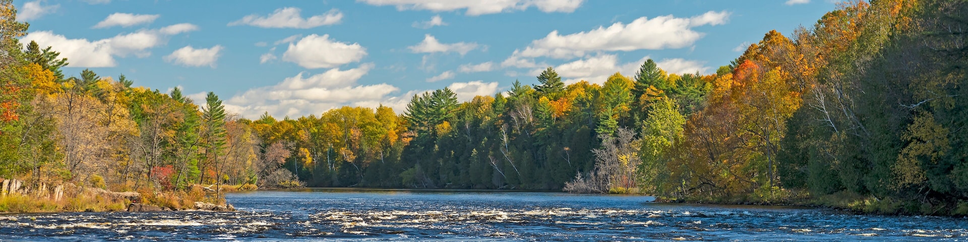 North Woods River Flowing into the Fall Colors