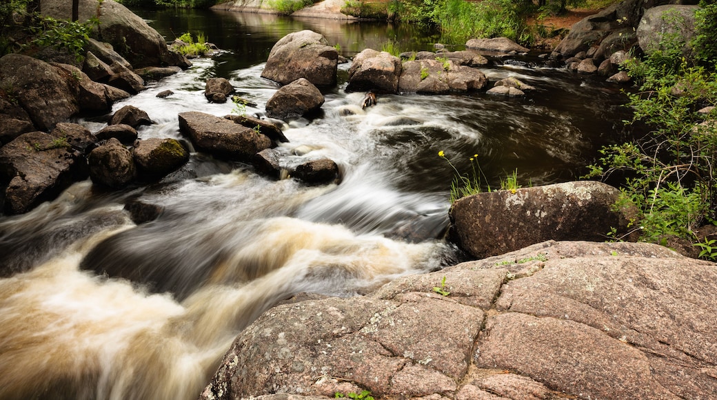 The Pike River enters a small section of the upper falls at Dave's Falls Marinette County Park, Amberg, Wisconsin in early July