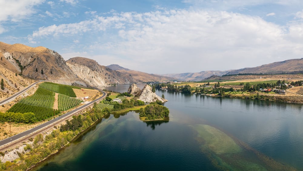 Aerial drone view of Columbia River by Maplecreek and Orondo in Washington with two rock outcroppings in the river
