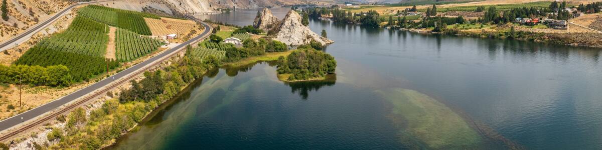 Aerial drone view of Columbia River by Maplecreek and Orondo in Washington with two rock outcroppings in the river