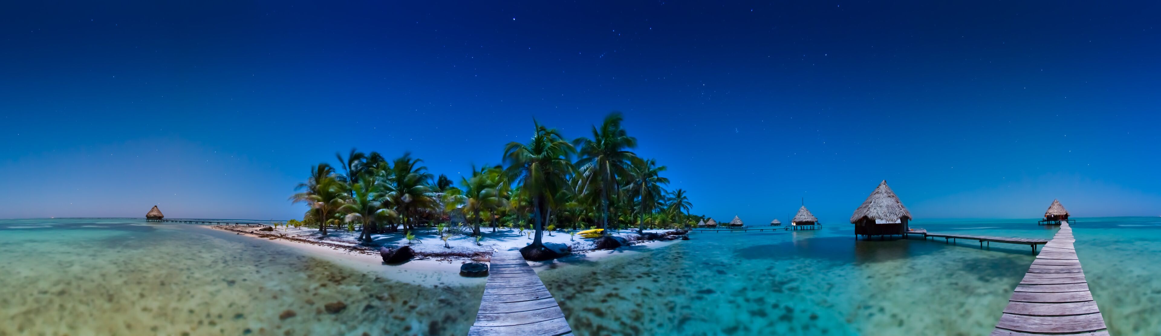 Panorama of Glover's Reef Atoll, a small island paradise in the Caribbean Sea 35 miles off the coast of Belize, known for diving, snorkeling and adventure.