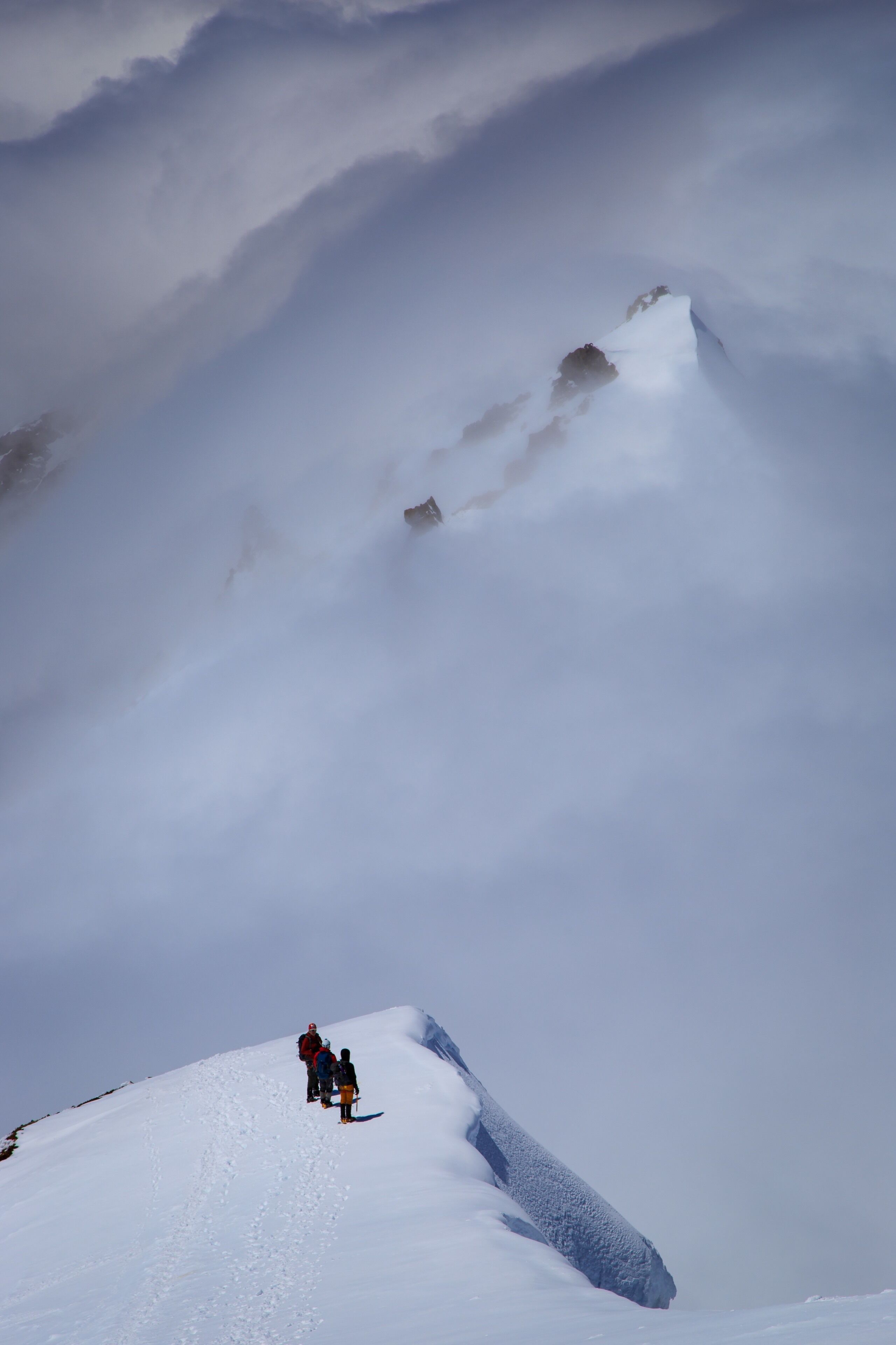 From a climb up the Coleman and Deming Glaciers of Mt Baker in June, 2016. We ascended in a whiteout. The clouds cleared as we neared the Roman Wall and remained below the rest of the day. #adventure #mtbaker #pnw #washington