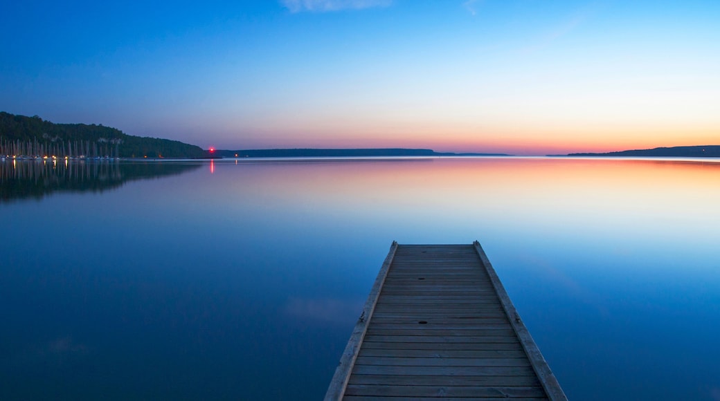 Wooden dock over still lake