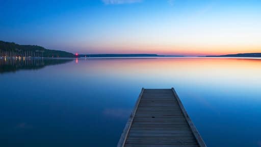 Wooden dock over still lake