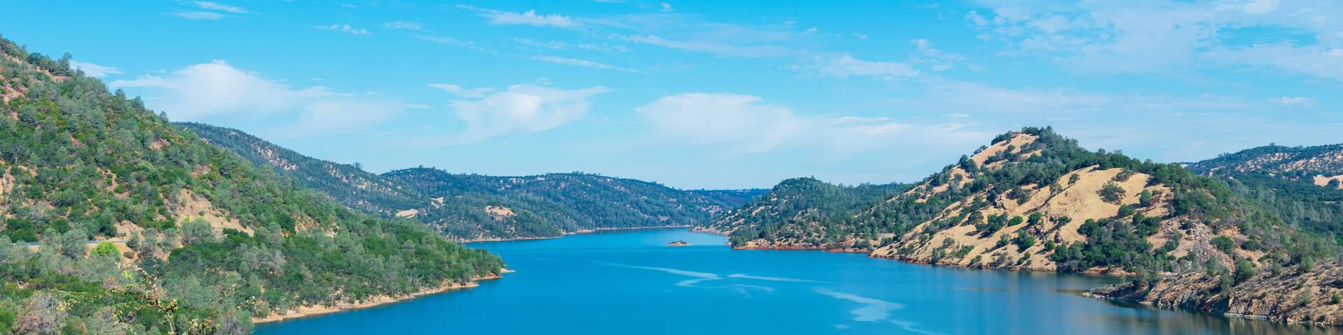 Aerial panorama of Don Pedro reservoir on Tuolumne River, Sierra Nevada foothills, California