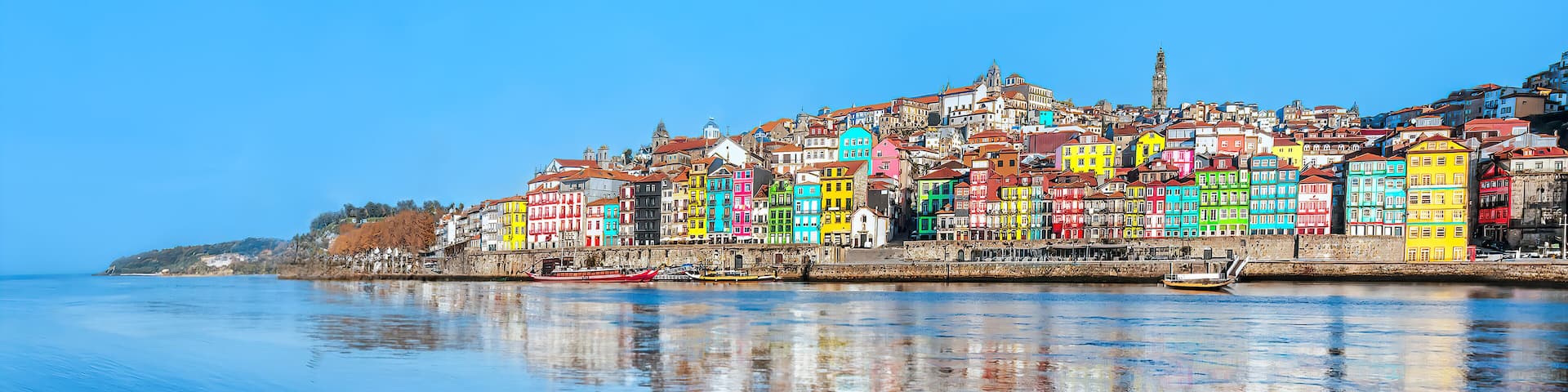 Portugal, Porto - Panoramic view of colorful medieval houses at Douro river bank in Oporto old town - Portuguese landmark city