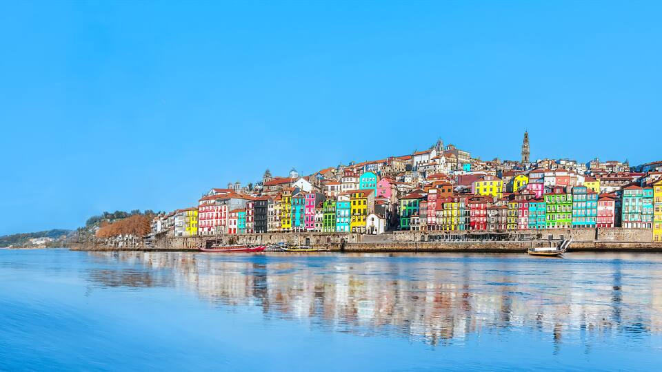 Portugal, Porto - Panoramic view of colorful medieval houses at Douro river bank in Oporto old town - Portuguese landmark city