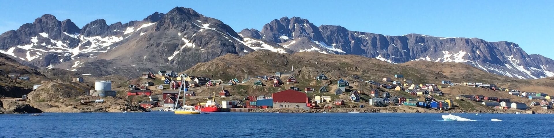 Greenland must be magical in winter, but it’s outright beautiful in summer. The sky is blue with no air traffic clouding anything, and the colorful houses give a nice contrast. #lifeatexpedia #water #blue #greenland #colorful