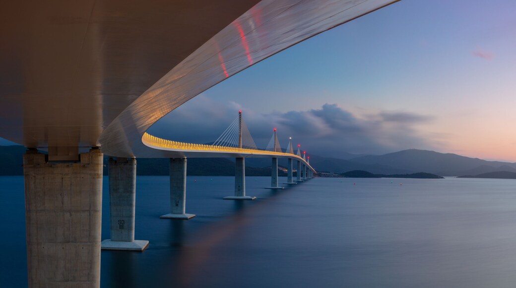 Peljesac Bridge, Croatia. Panoramic image of beautiful modern multi-span cable-stayed Peljesac Bridge over the sea in Dubrovnik-Neretva County, Croatia at sunset.