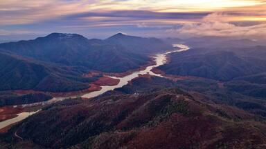 shasta lake mccloud arm hirz bay sunset purple mountains shasta national forest