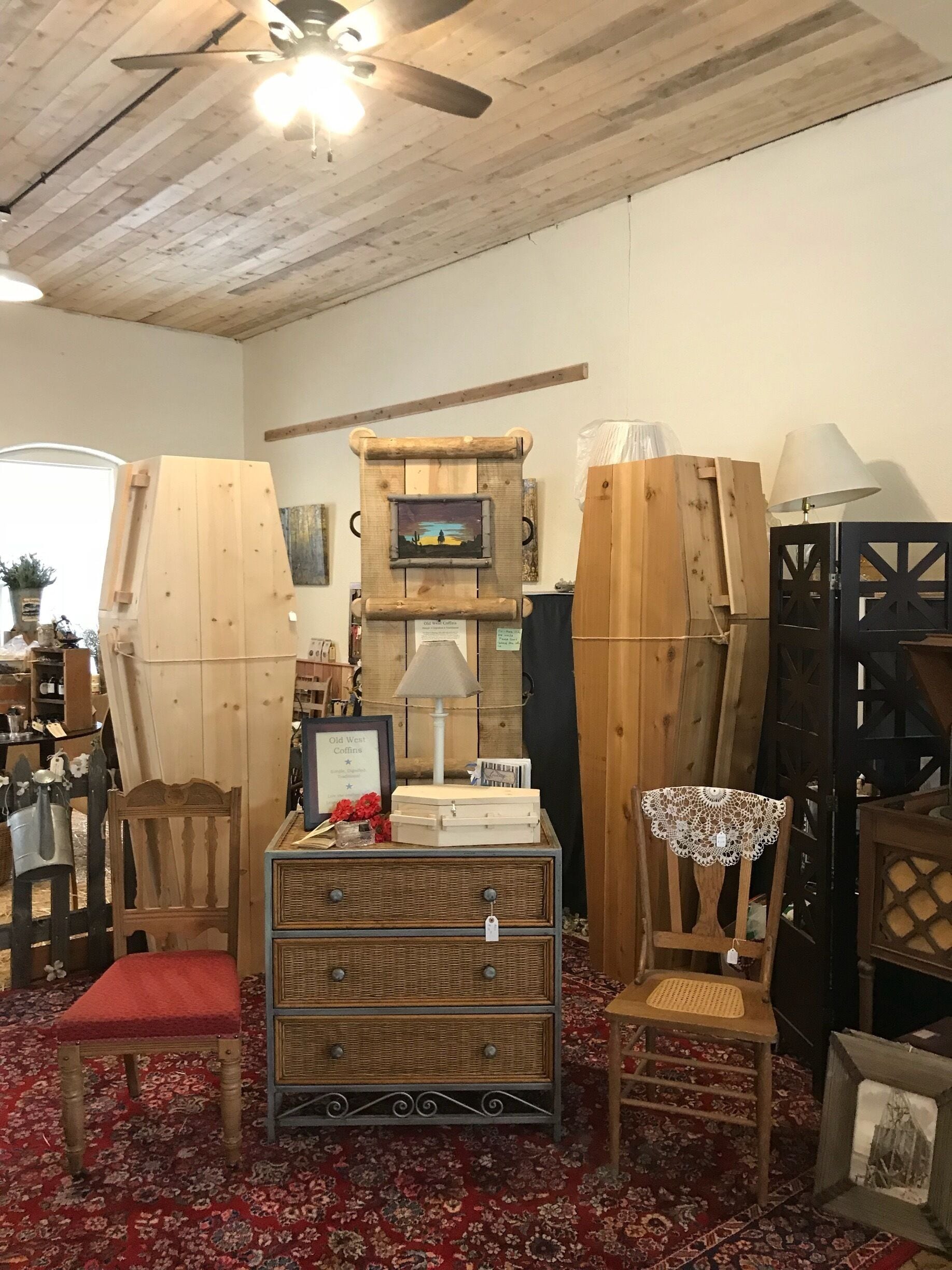 The store also doubles as a coffin shop and yes these are coffins that are for sale.  The nicest one in the center is only $850...seriously I want to be buried in one.