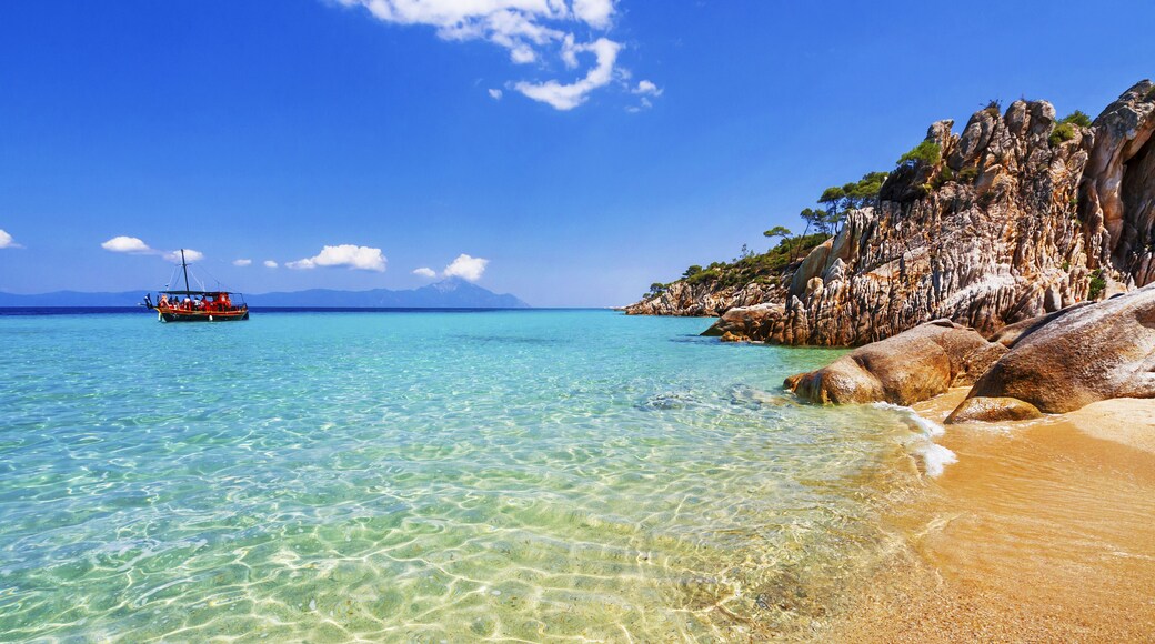 Paradise bay beach, untouched nature abstract archipelago in seashore with rocks in water on peninsula Halkidiki, Greece