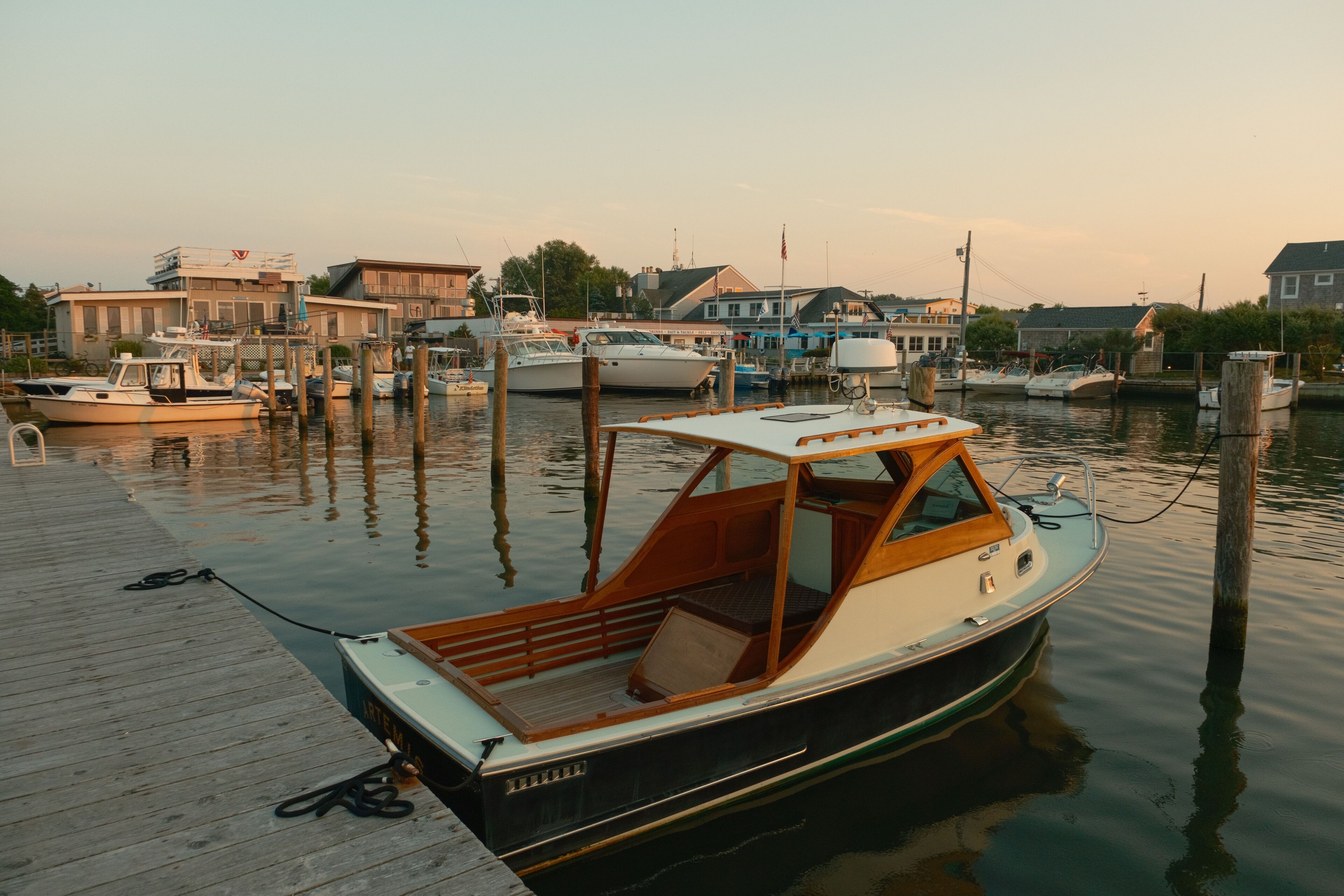 Boats in a marina in the village of Kismet, on Fire Island, New York