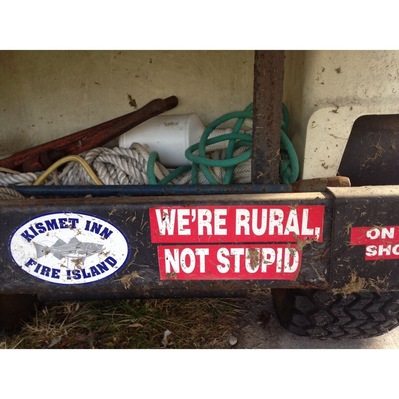 On the back of one of the local golf carts.. Fire island in the winter is VERY rural .. There are no roads! No cars .. No stores on the winter .. Very hard place to live .. I love this sticker !