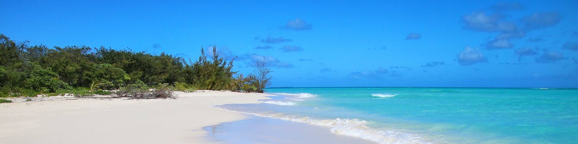 Sandy beach on the shore of Ouvea Lagoon, Mouli Island, Loyalty Islands, New Caledonia.
