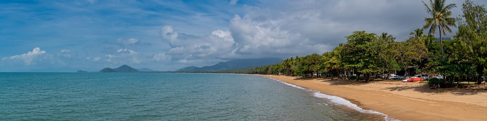 Palm Cove is a tiny enclave of fine dining, luxury resorts and spectacular pools beside a palm fringed beach.