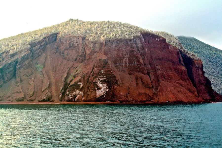Red beaches and red volcanic rock of Rabida Island, Ecuador - Galapagos. Unique and spectacular landscapes of this archipelago. #waterlust #galapagos
