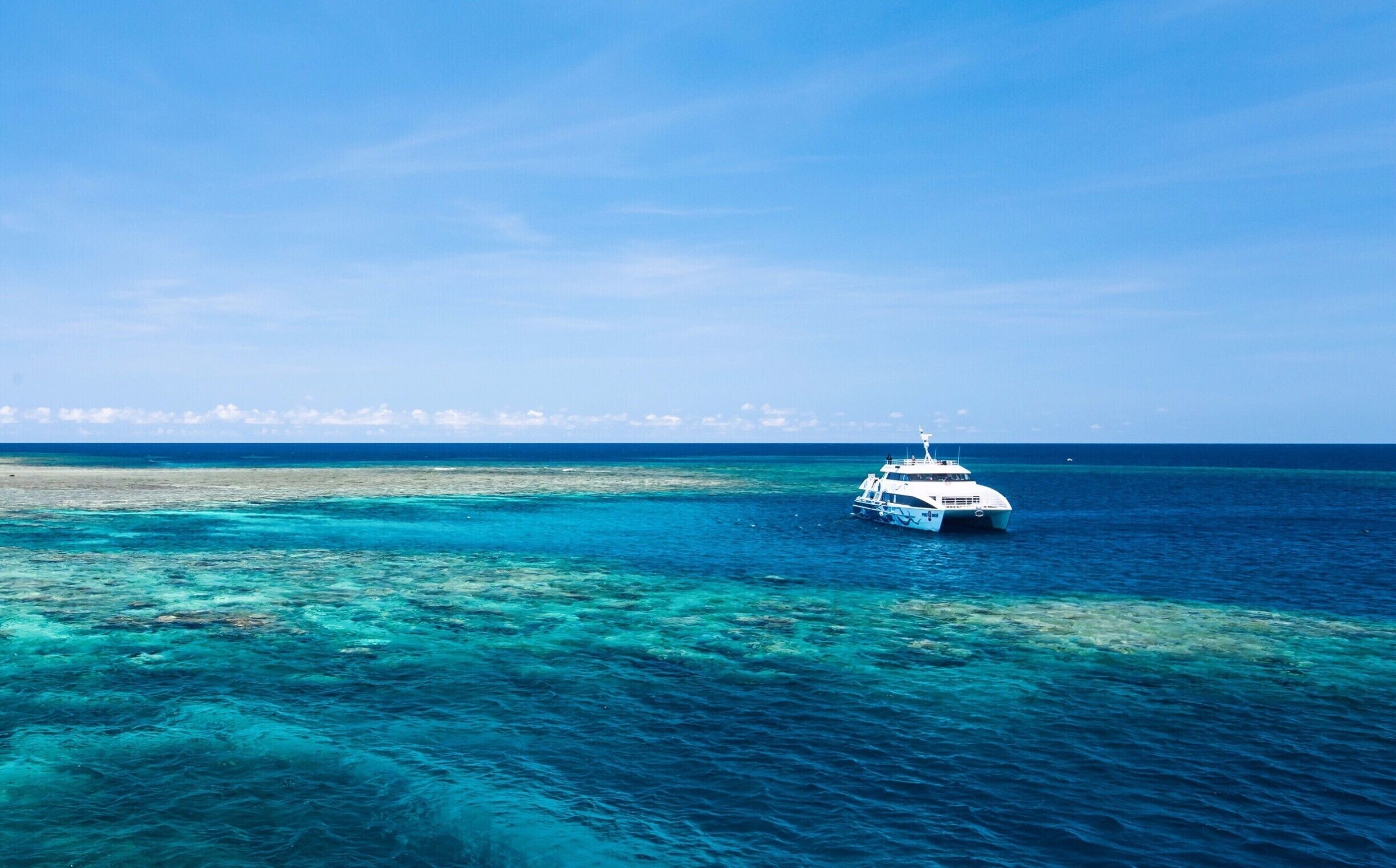 The crystal clear waters of the Great Barrier Reef are a great place to learn to dive!