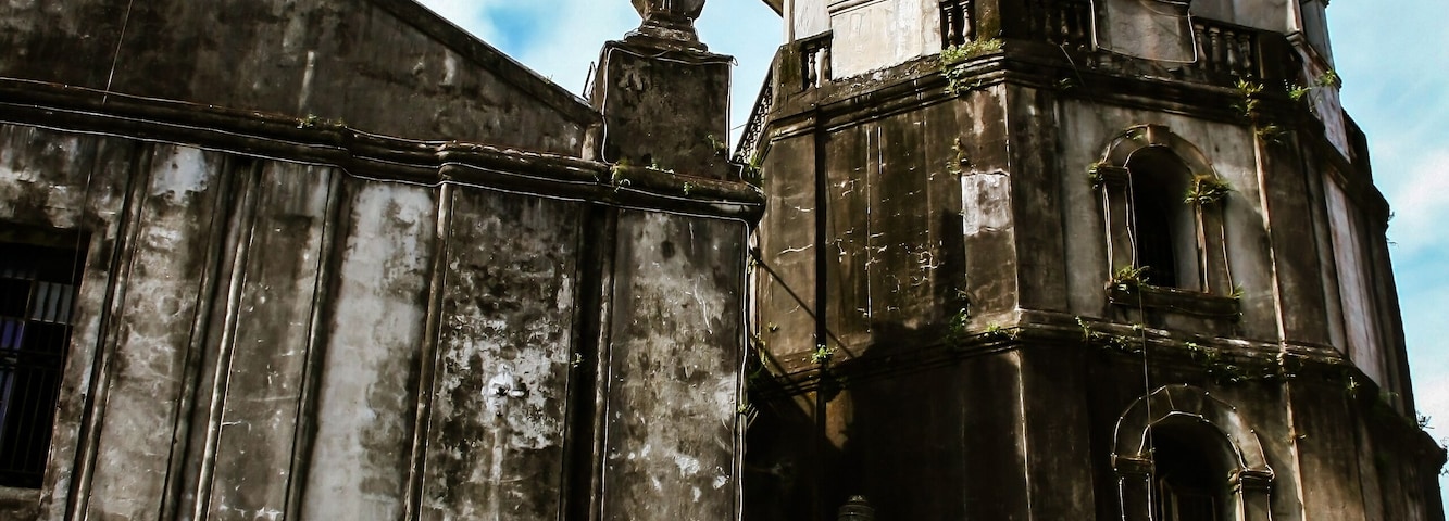 The belfry of Our Lady of Candelaria Parish Church in Silang, Spanish colonial style, first built in 1585, Cavite Province, Luzon island, Philippines. National Cultural Treasure.