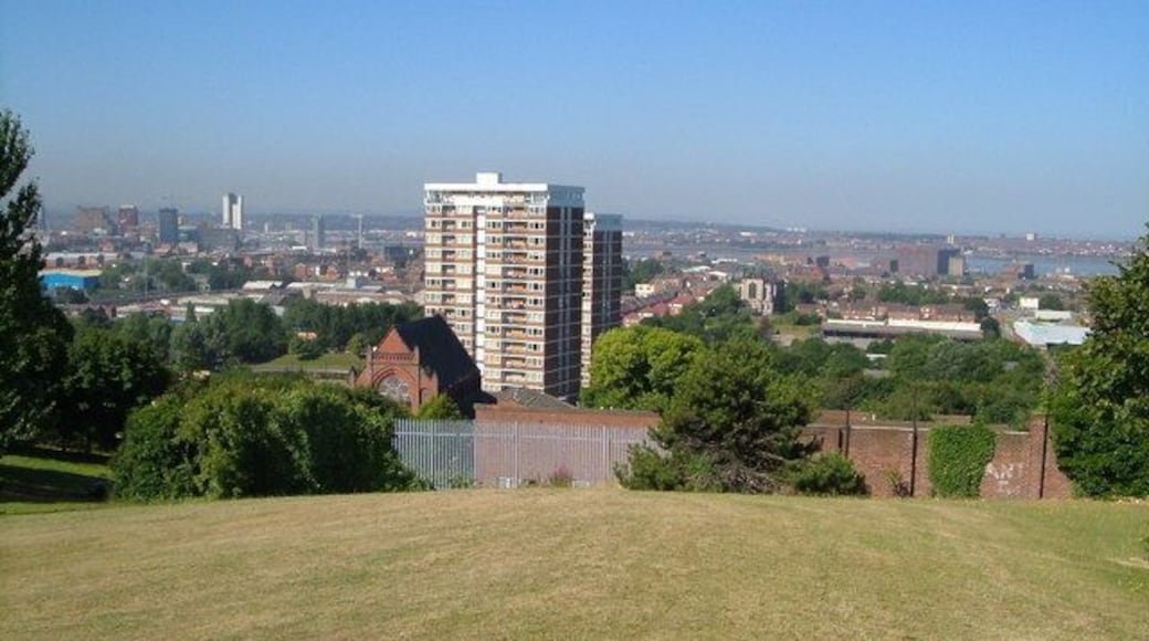 River Mersey from Everton Park. Prominent buildings in this view are St Polycarp's Church on Netherfield Road and, further away, St Anthony's Church on Scotland Road, either side of the block of flats on Conway Street. The Mersey can be seen between the buildings of Vauxhall.