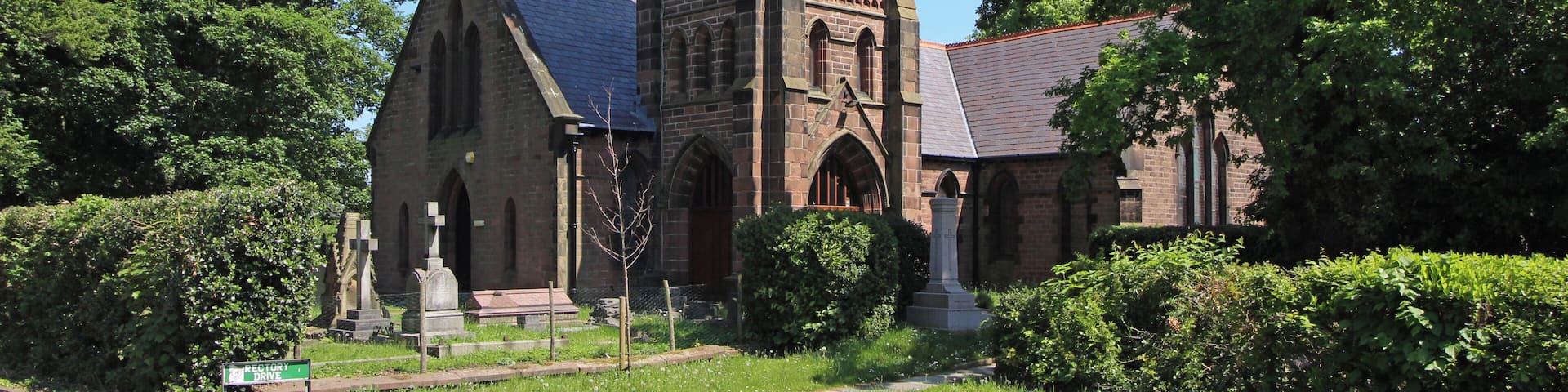 Grade II listed church, 1839, in Halewood, Knowsley, Merseyside. Difficult to view the whole of the frontage, and this is the most complete view you'll get.