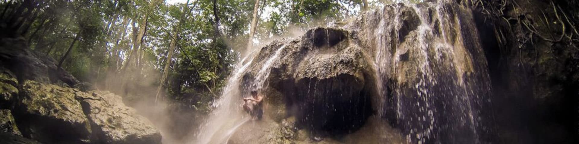 The hot spring waterfall of Finca El Paraíso is the perfect place for meditation.