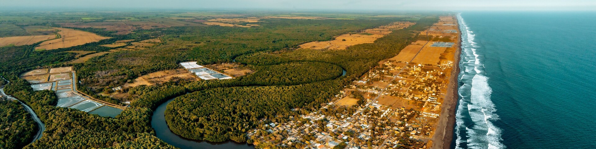 High-angle view of a beautiful river flowing in the forest in El Paredon, Guatemala