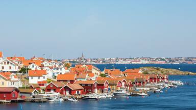 Fiskebackskil an old fishing village on the Swedish west coast, with Lysekil city in the background