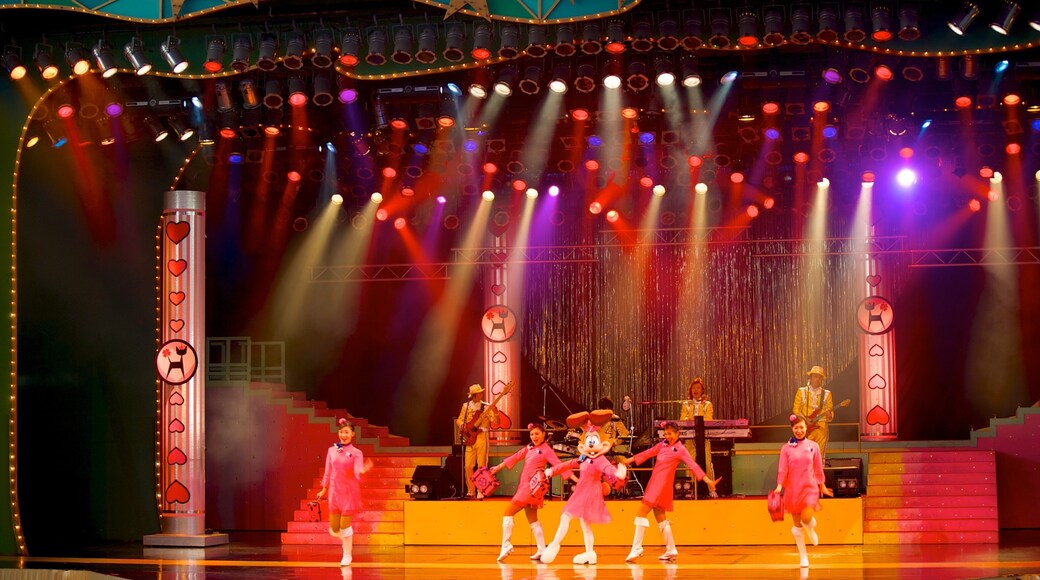 Yahatahigashi which includes performance art, interior views and music