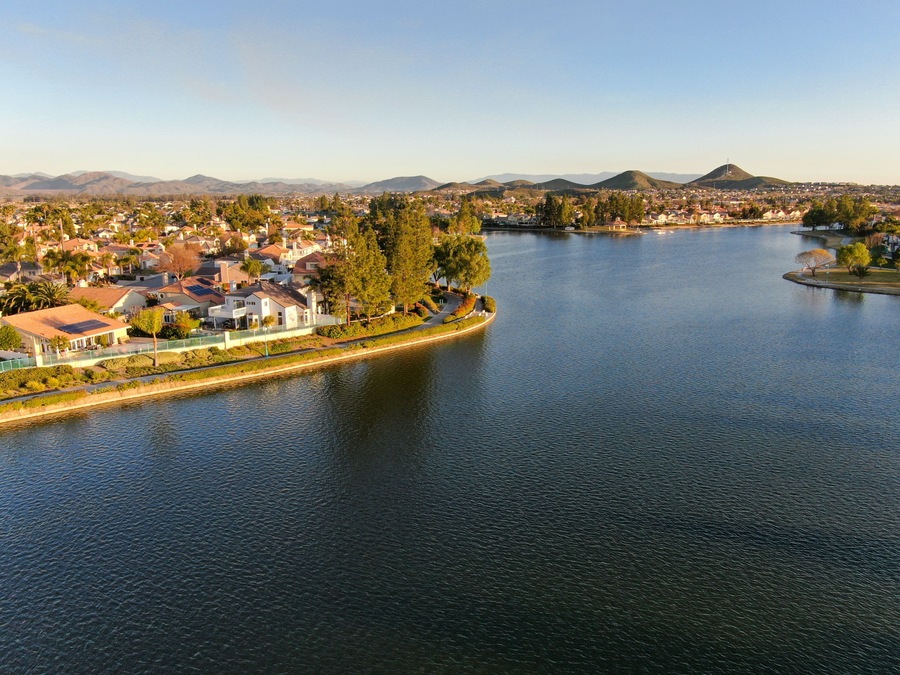 Aerial view of Menifee Lake and neighborhood, residential subdivision vila during sunset. Riverside County, California, United States