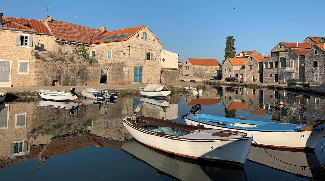 The beautiful canals of the fisherman’s village Vrboska on the island Hvar in Croatia. The canals give it the nickname ‘Little Venice’