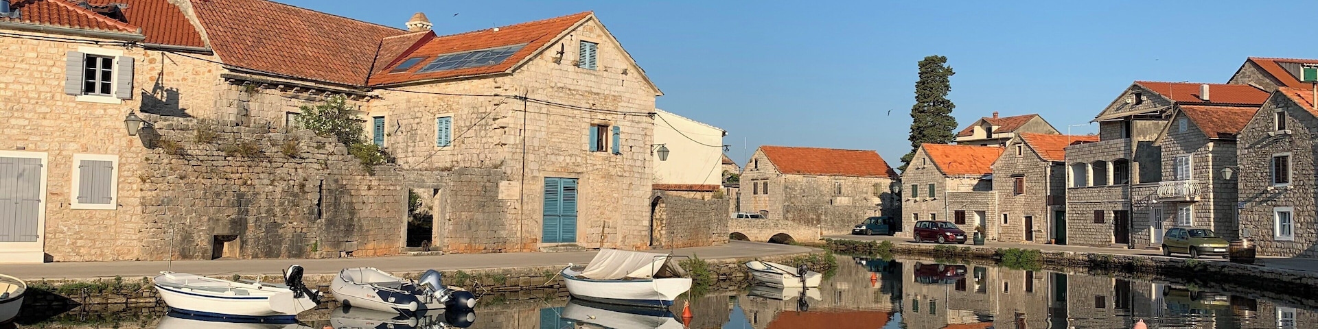 The beautiful canals of the fisherman’s village Vrboska on the island Hvar in Croatia. The canals give it the nickname ‘Little Venice’