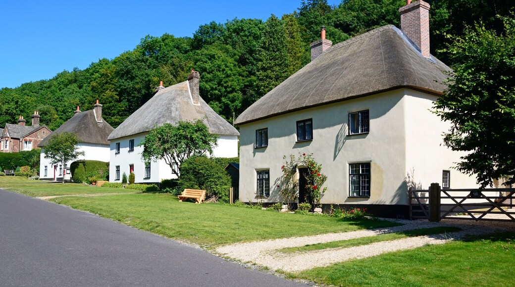 View along the pretty village street with thatched cottages, Milton Abbas.