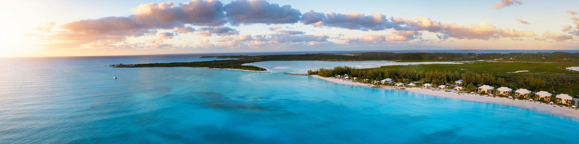 Aerial view of the beautiful Cape Santa Maria Beach, Long island, Caribbean, Bahamas during sunset time