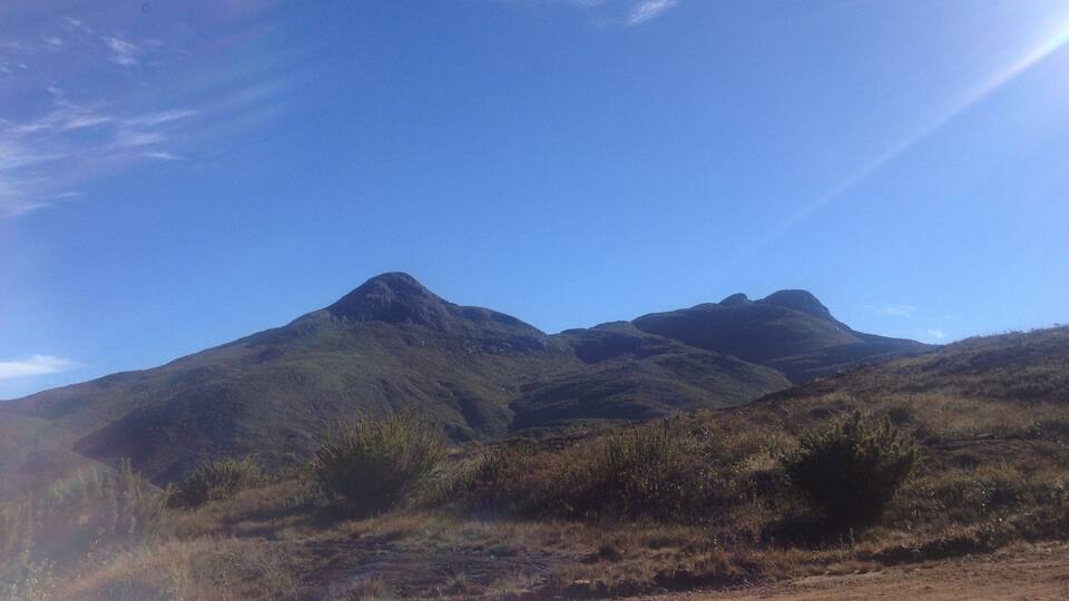 A mountain range with a clear sky.