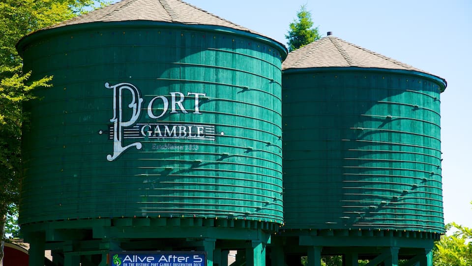 Two green water towers with 'Port Gamble' written on them.