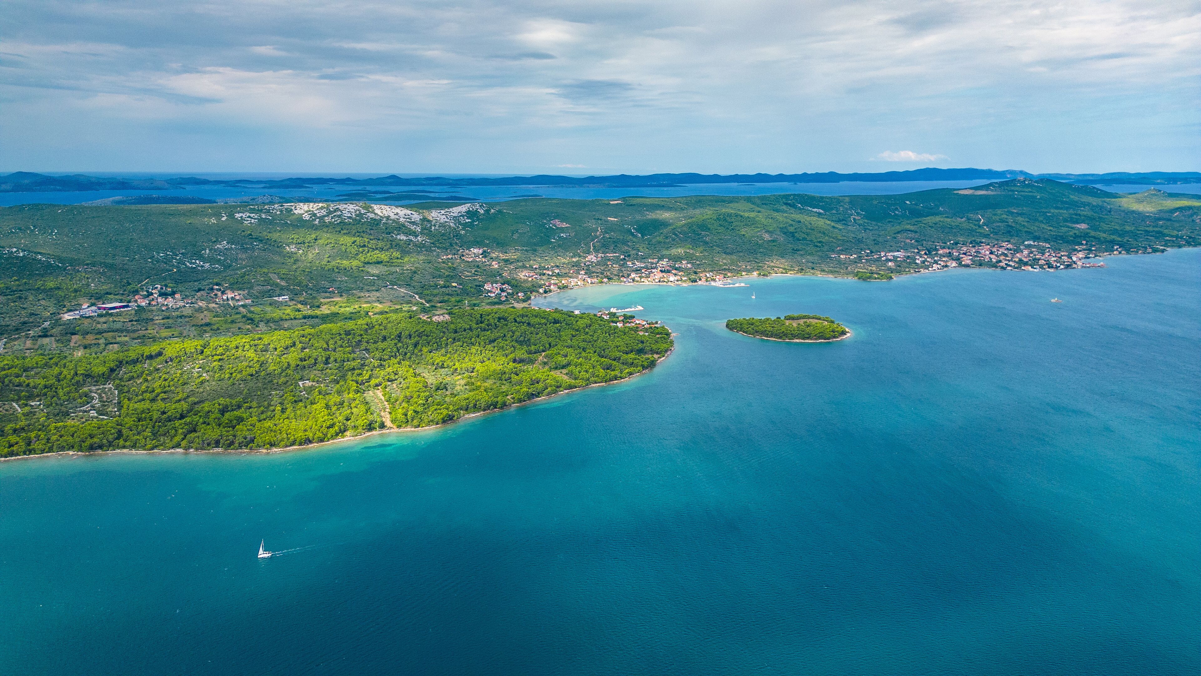 Aerial view of Galešnjak, the famous heart-shaped island located near Sveti Filip i Jakov in the Adriatic Sea, Croatia. Known as the “Island of Love,” it is one of the world’s most romantic natural