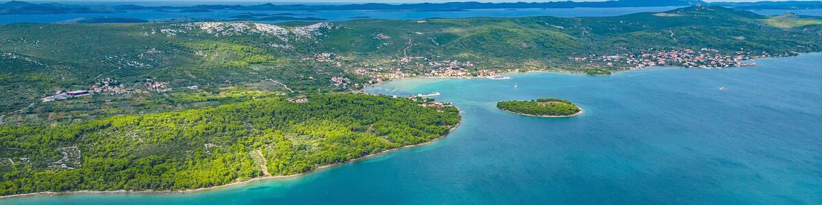 Aerial view of Galešnjak, the famous heart-shaped island located near Sveti Filip i Jakov in the Adriatic Sea, Croatia. Known as the “Island of Love,” it is one of the world’s most romantic natural