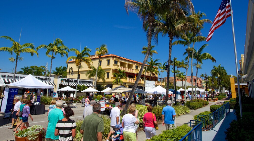 5th Avenue Shopping District which includes markets, street scenes and a city