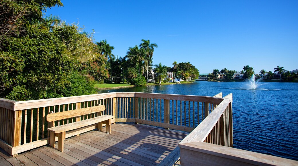 5th Avenue Shopping District showing a lake or waterhole, views and a park