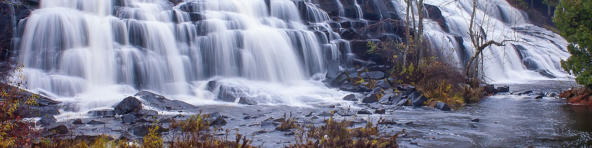 waterfall in autumn forest
