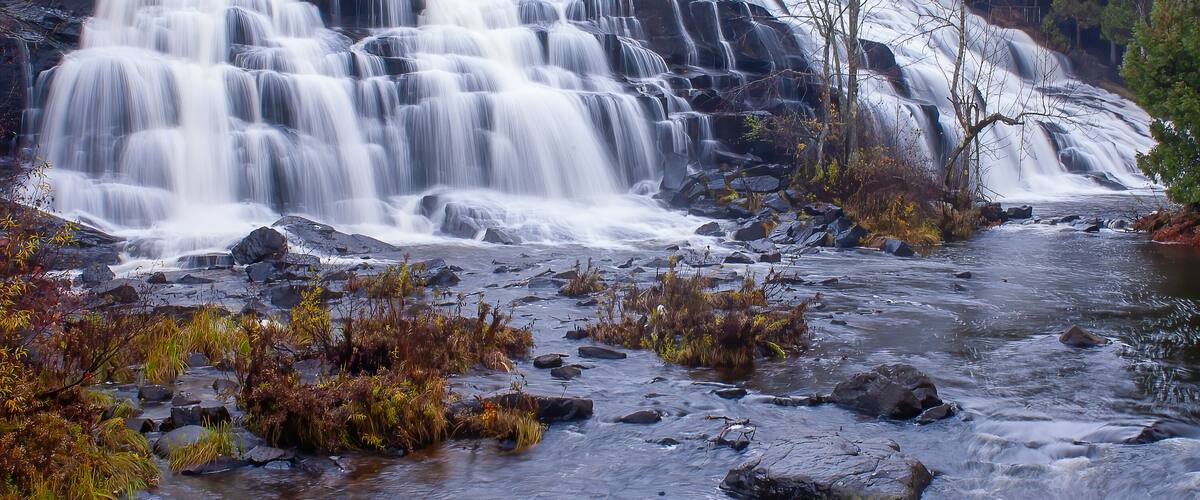 waterfall in autumn forest