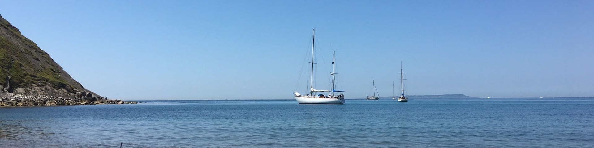 It's not Greece, is England indeed.  Worbarrow beach, Dorset, a half mile walk from Tyneham leads you to this paradise!