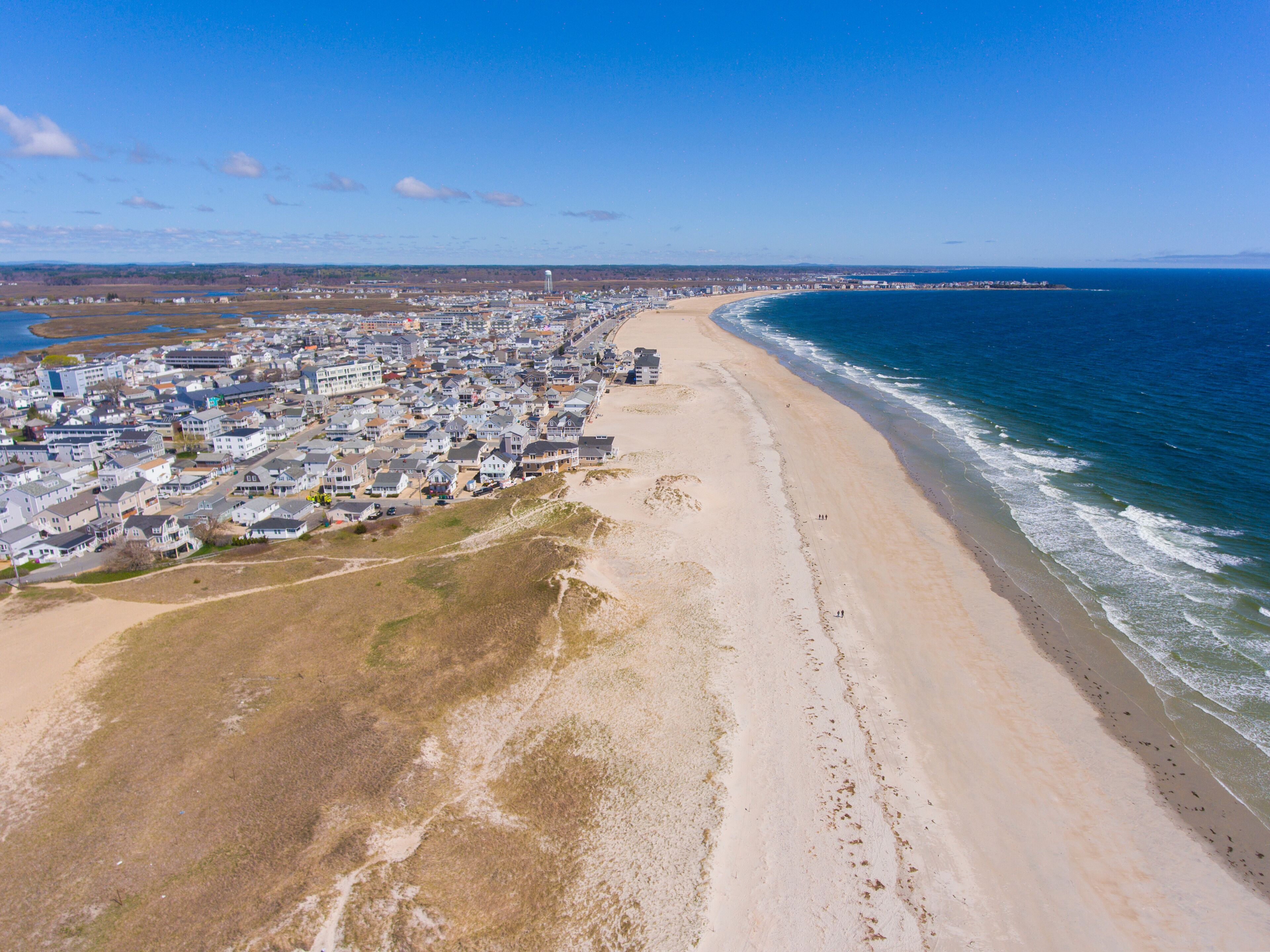 Hampton Beach aerial view including historic waterfront buildings on Ocean Boulevard and Hampton Beach State Park, Town of Hampton, New Hampshire NH, USA.