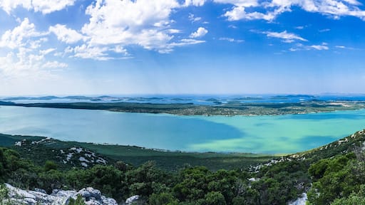 Pano view from Kamenjak of Vransko Jezero and Adriatic sea