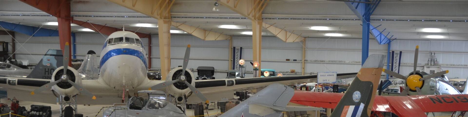 A Canadair Sabre Mk. VI (and lots of other airplanes) seen from the viewing gallery at the War Eagles Air Museum.
